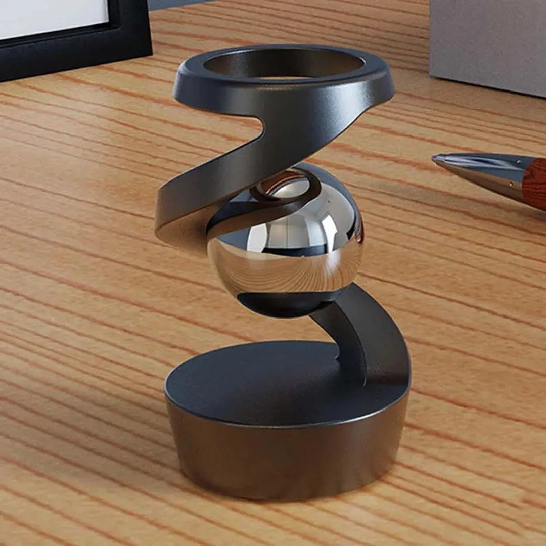 Kinetic Desk Gadget Showcasing Floating Gravity