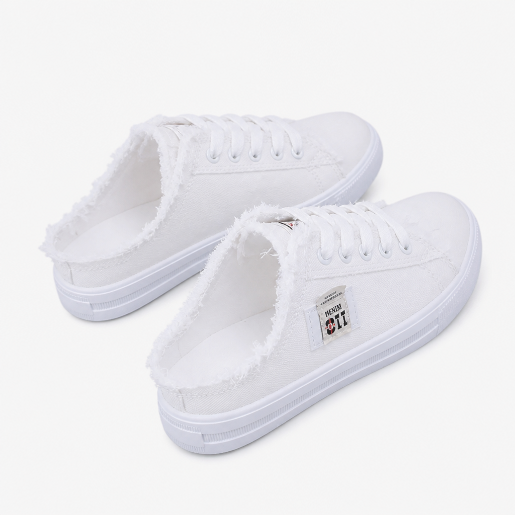 StridePulse™ – Casual Denim Mule Sneakers with Frayed Edges