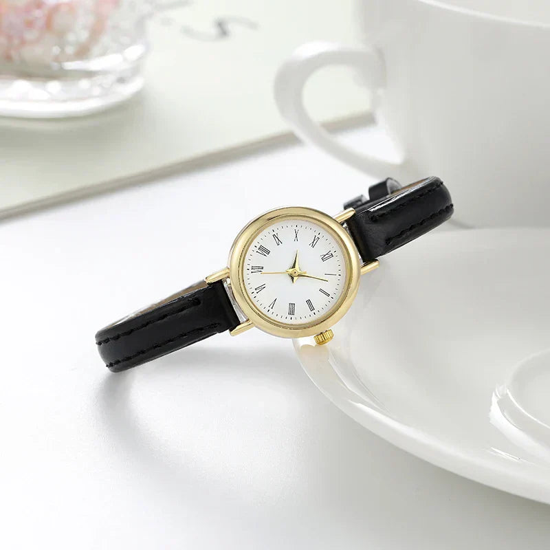 Sophisticated Gold Women's Timepiece with Roman Numerals