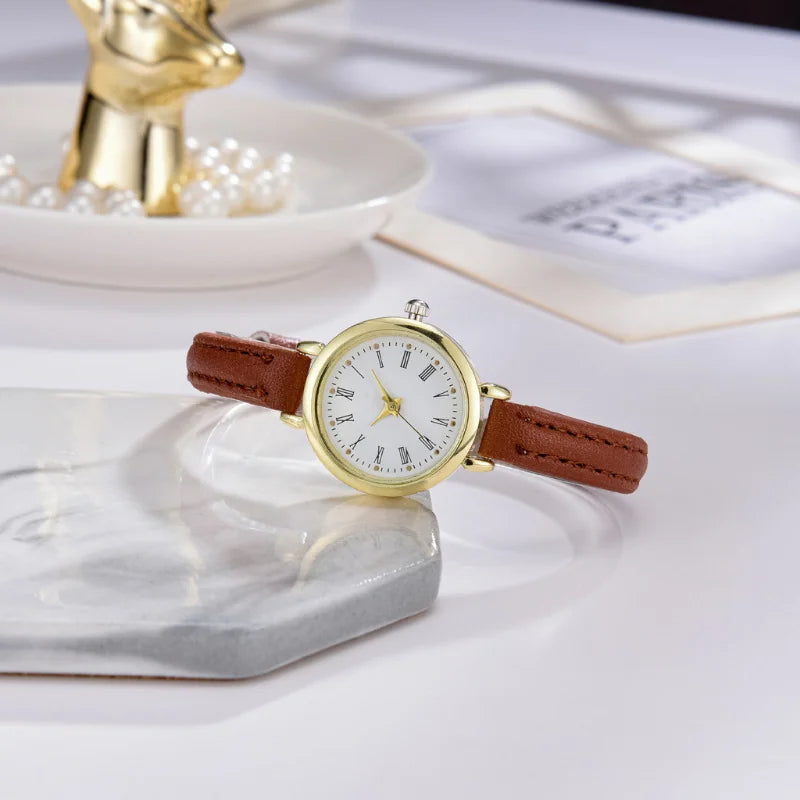 Sophisticated Gold Women's Timepiece with Roman Numerals