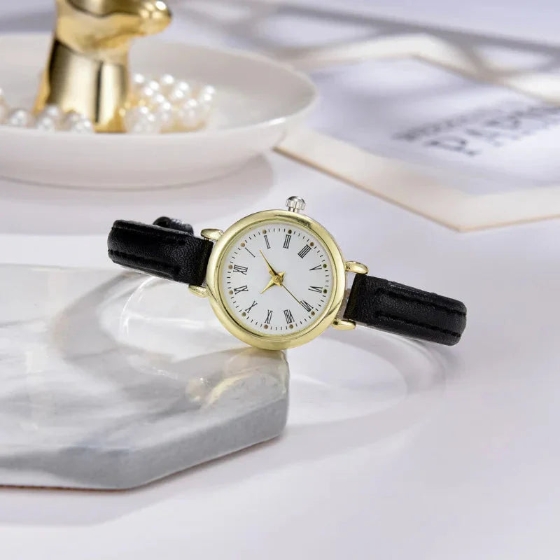 Sophisticated Gold Women's Timepiece with Roman Numerals