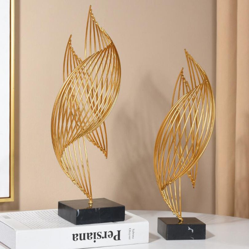 Fluid Elegance: Contemporary Gold Metal Art Piece