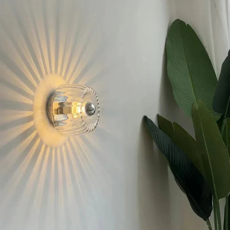 Elegant Wall Fixture with Glass Shade for Modern Spaces