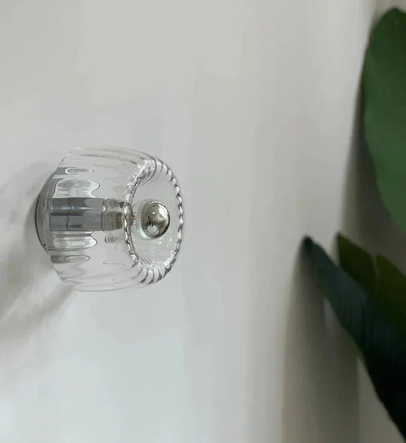 Elegant Wall Fixture with Glass Shade for Modern Spaces