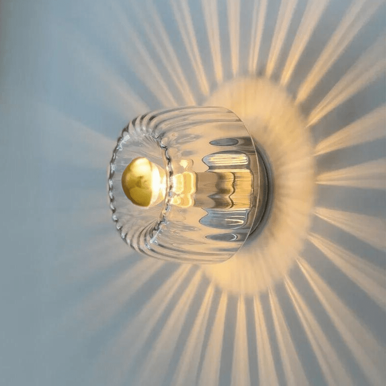 Elegant Wall Fixture with Glass Shade for Modern Spaces