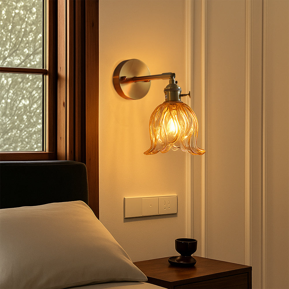 Elegant Wall Sconce with Glass Shade and Metal Frame