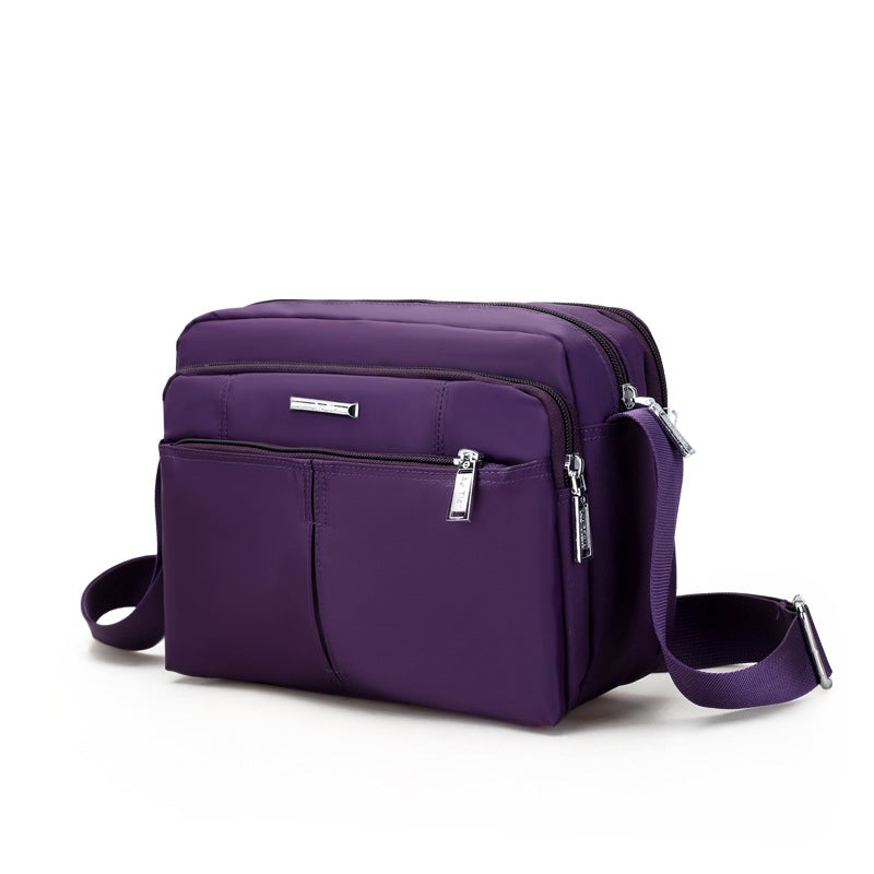 Water-Resistant Multi-Compartment Crossbody Bag with Adjustable Strap