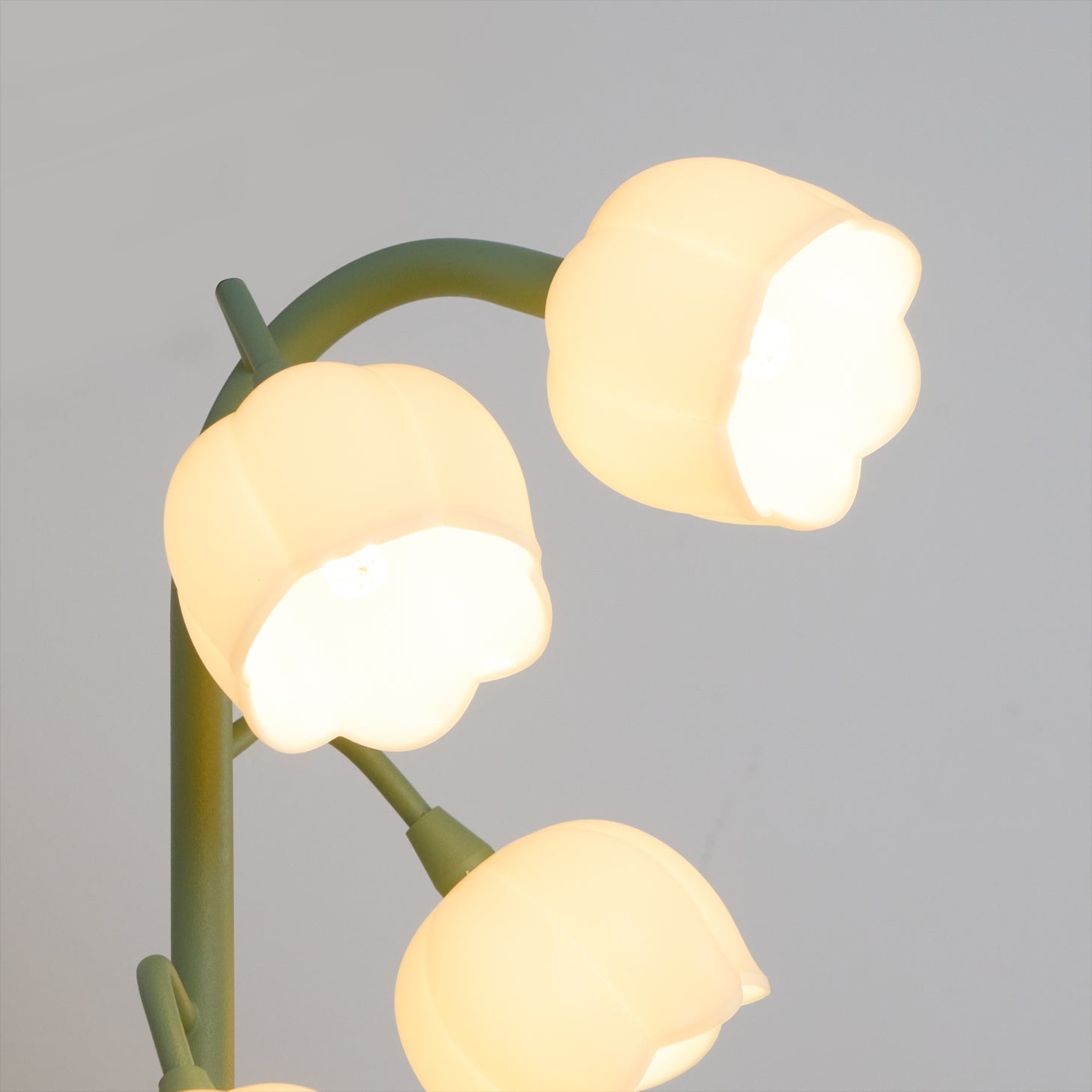 Table lamp featuring a bell orchid