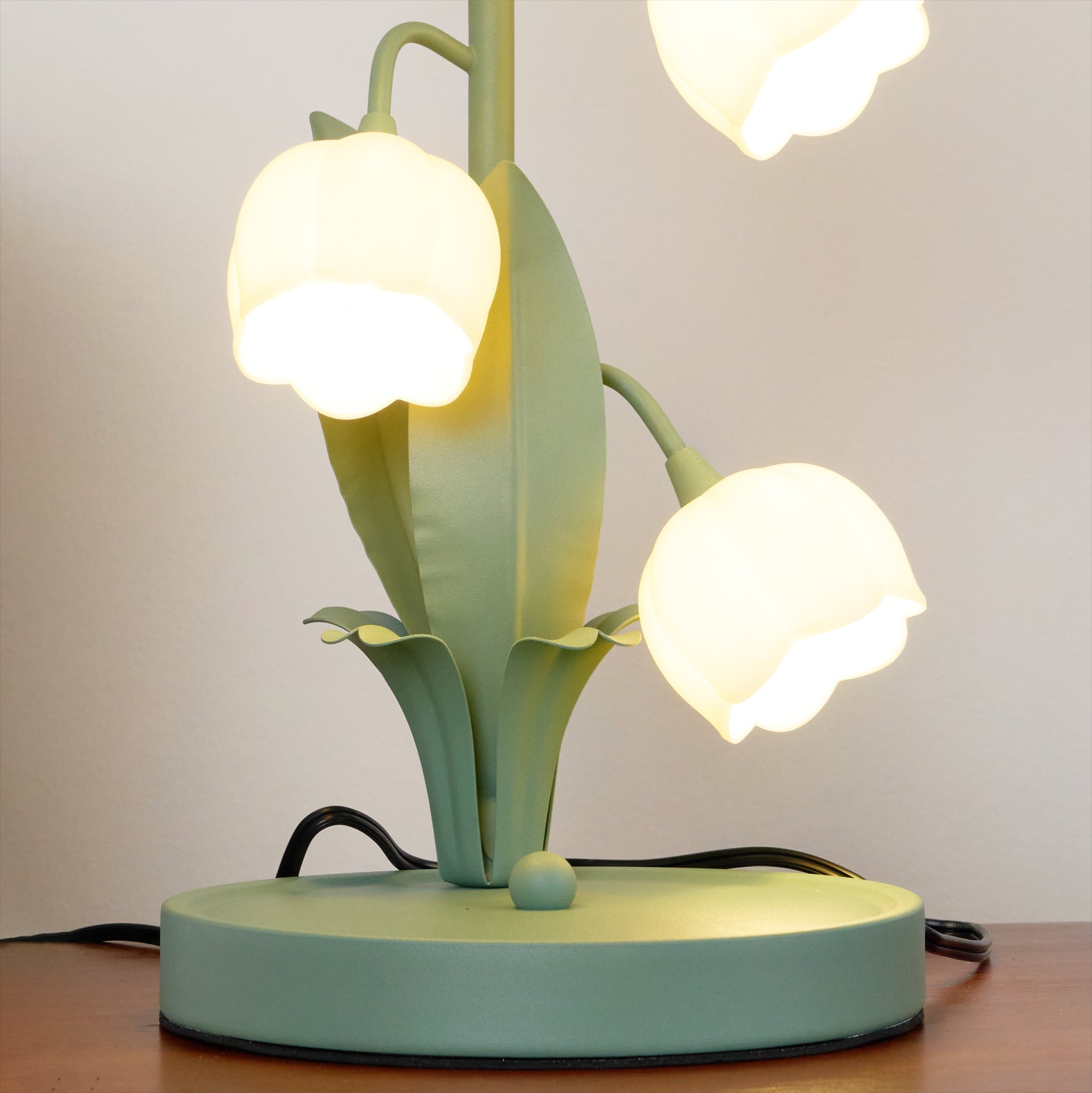 Table lamp featuring a bell orchid