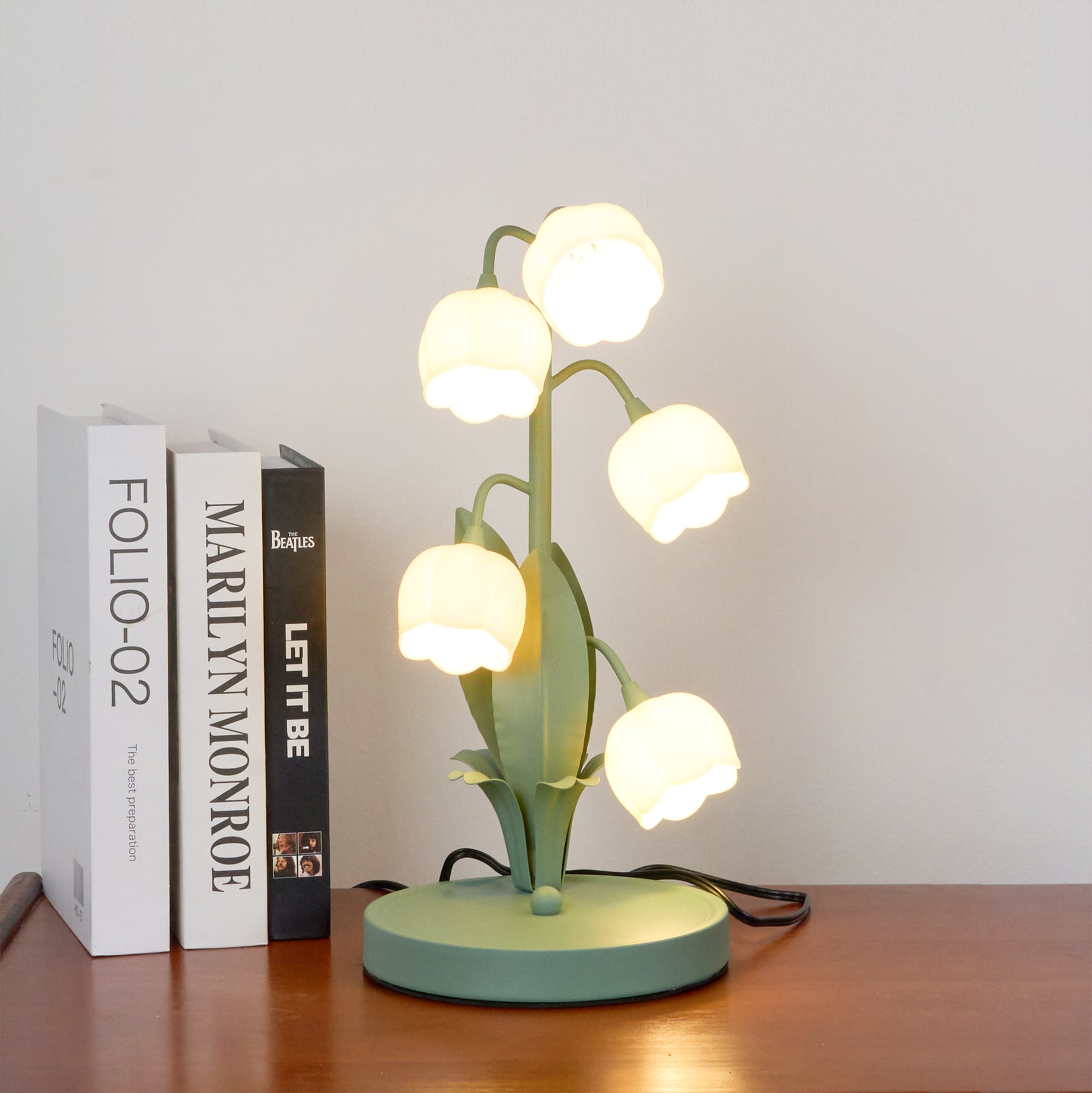 Table lamp featuring a bell orchid