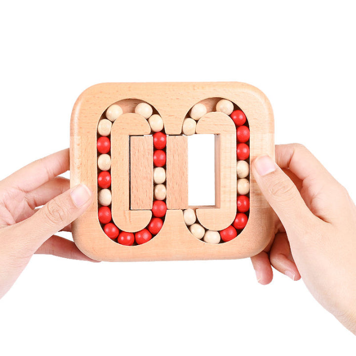 Wooden puzzle game with rotating pieces