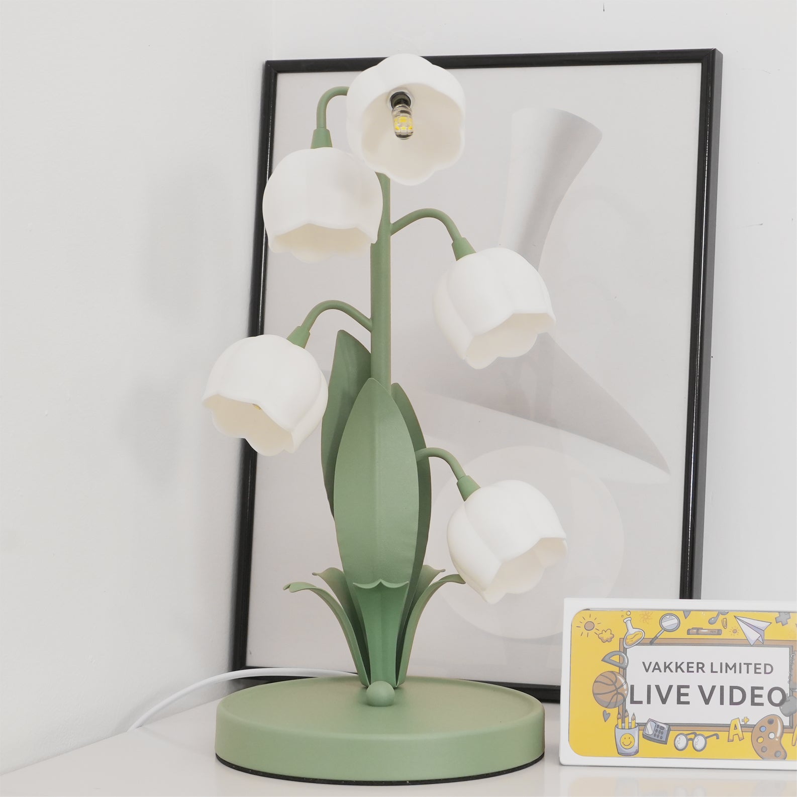 Table lamp featuring a bell orchid