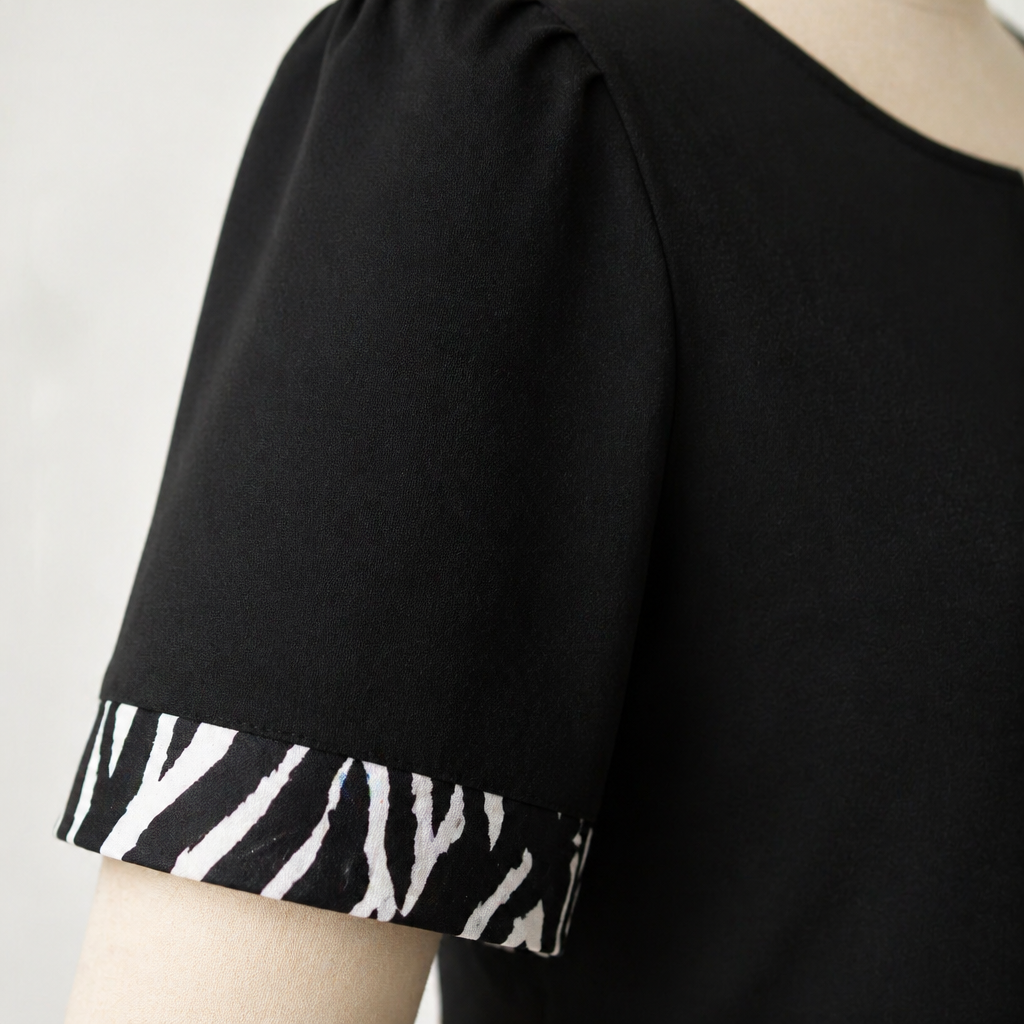 VeraNite™ – Striking Zebra Patchwork Maxi Dress Featuring Red Accent Detail