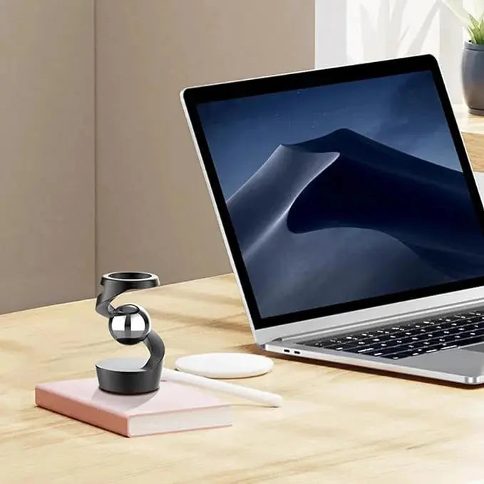 Kinetic Desk Gadget Showcasing Floating Gravity