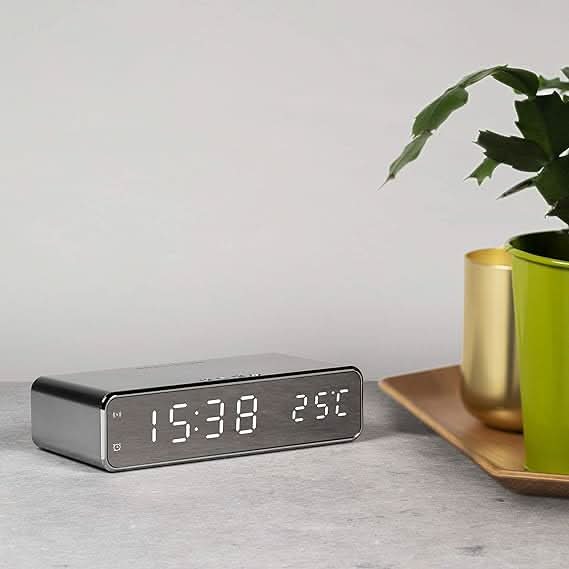 Sleek Alarm Clock with Integrated Wireless Charging Station