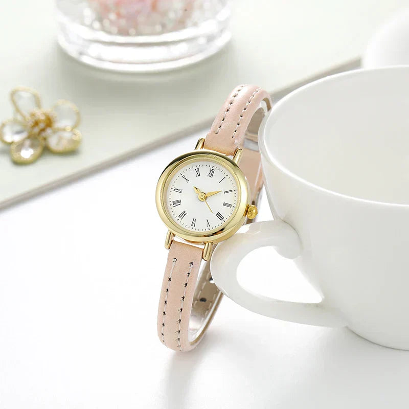Sophisticated Gold Women's Timepiece with Roman Numerals