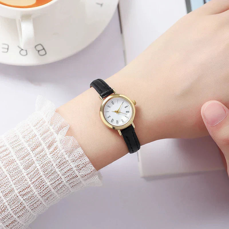 Sophisticated Gold Women's Timepiece with Roman Numerals
