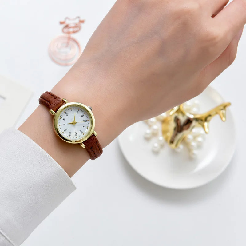 Sophisticated Gold Women's Timepiece with Roman Numerals