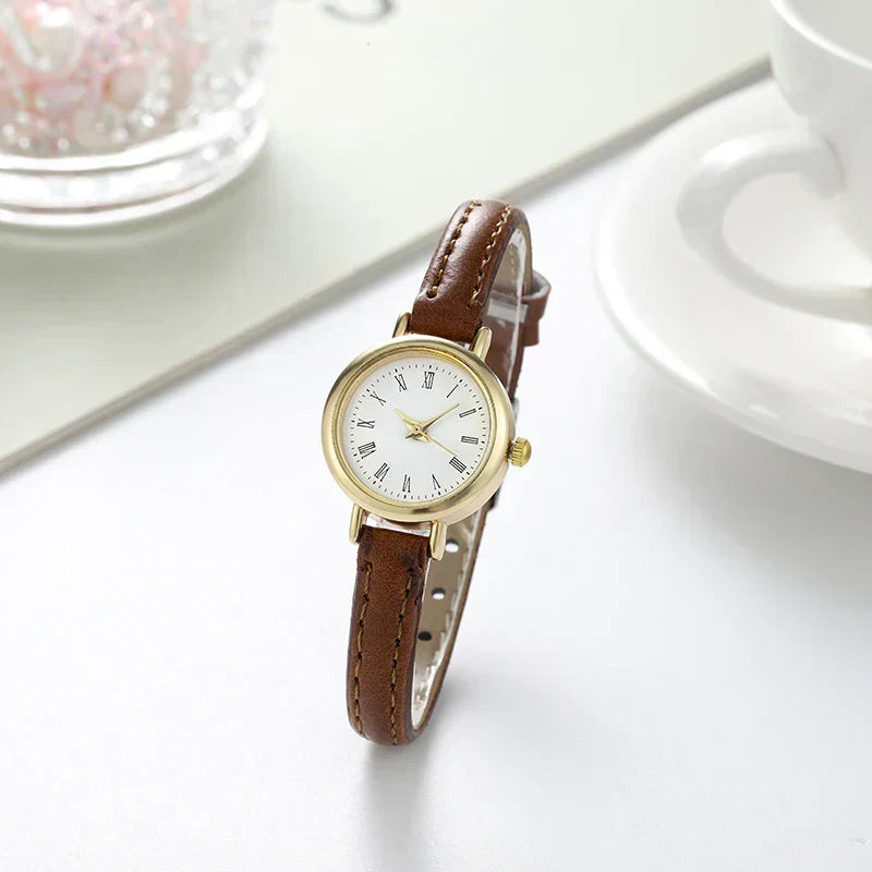 Sophisticated Gold Women's Timepiece with Roman Numerals
