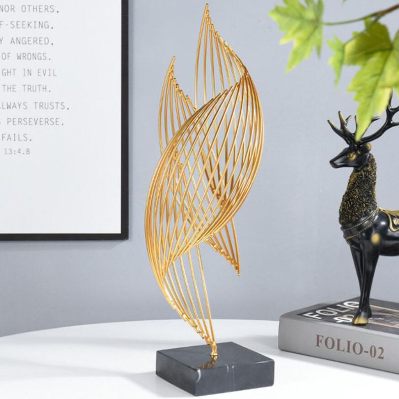 Fluid Elegance: Contemporary Gold Metal Art Piece