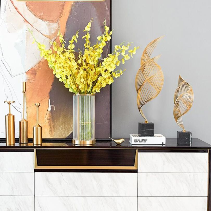 Fluid Elegance: Contemporary Gold Metal Art Piece