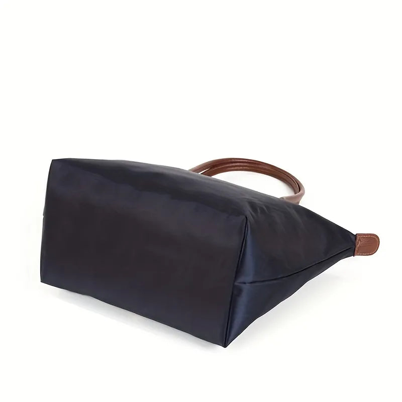 Chic Women's Tote Bag with Ample Storage and Stylish Accents