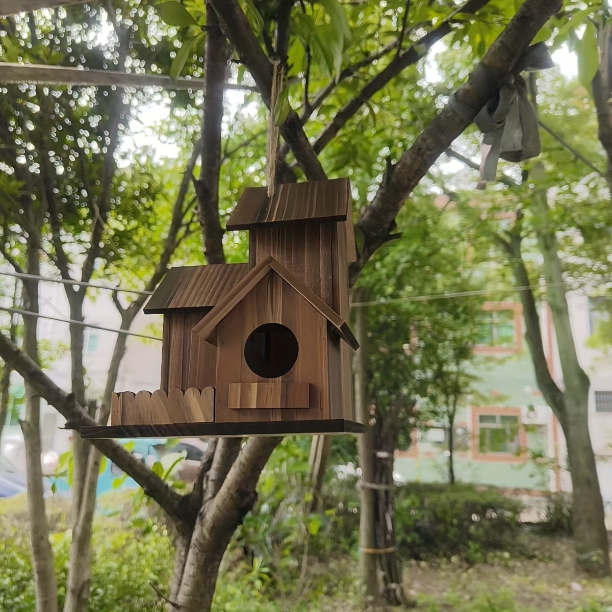 Charming Wooden Birdhouse with Spacious Nesting Compartments