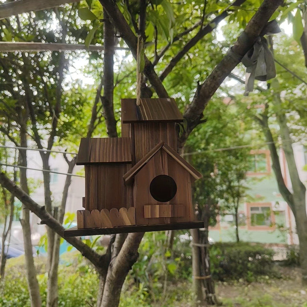 Charming Wooden Birdhouse with Spacious Nesting Compartments