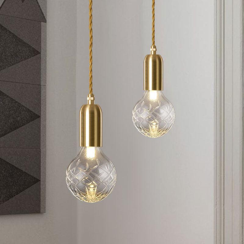 Elegant Gold Pendant Light with Adjustable Cord and Glass Bulb