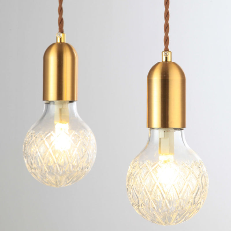 Elegant Gold Pendant Light with Adjustable Cord and Glass Bulb