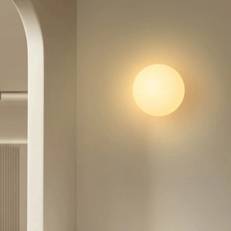 Elegant Sphere Wall Light with Metal Support for Indoor Use