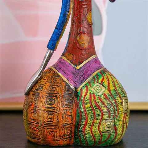 Elegant Modern Female Figure Sculpture in Vibrant Resin Art