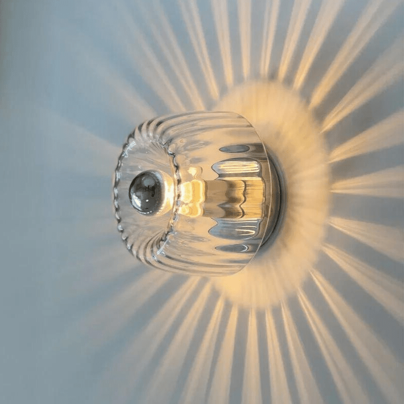 Elegant Wall Fixture with Glass Shade for Modern Spaces