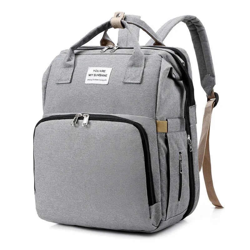Versatile Travel Backpack with Built-In Baby Crib and USB Charging
