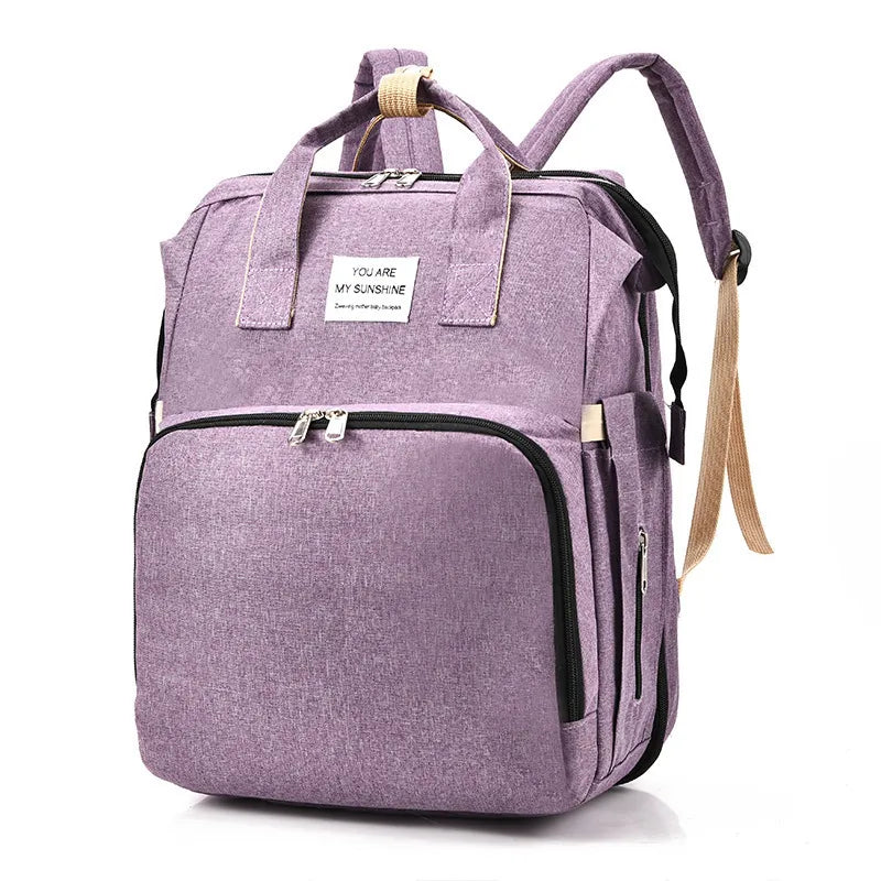 Versatile Travel Backpack with Built-In Baby Crib and USB Charging