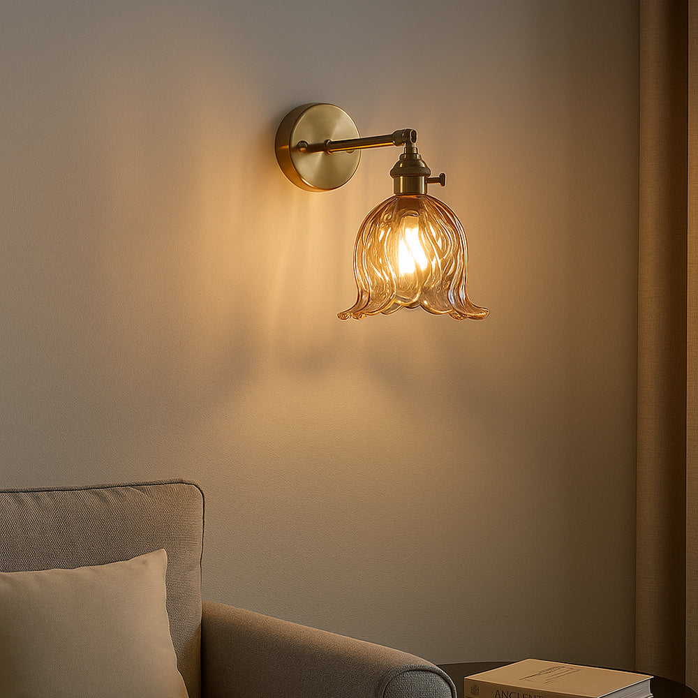 Elegant Wall Sconce with Glass Shade and Metal Frame