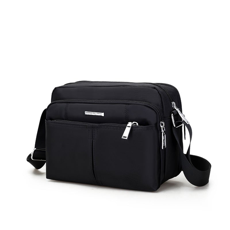 Water-Resistant Multi-Compartment Crossbody Bag with Adjustable Strap