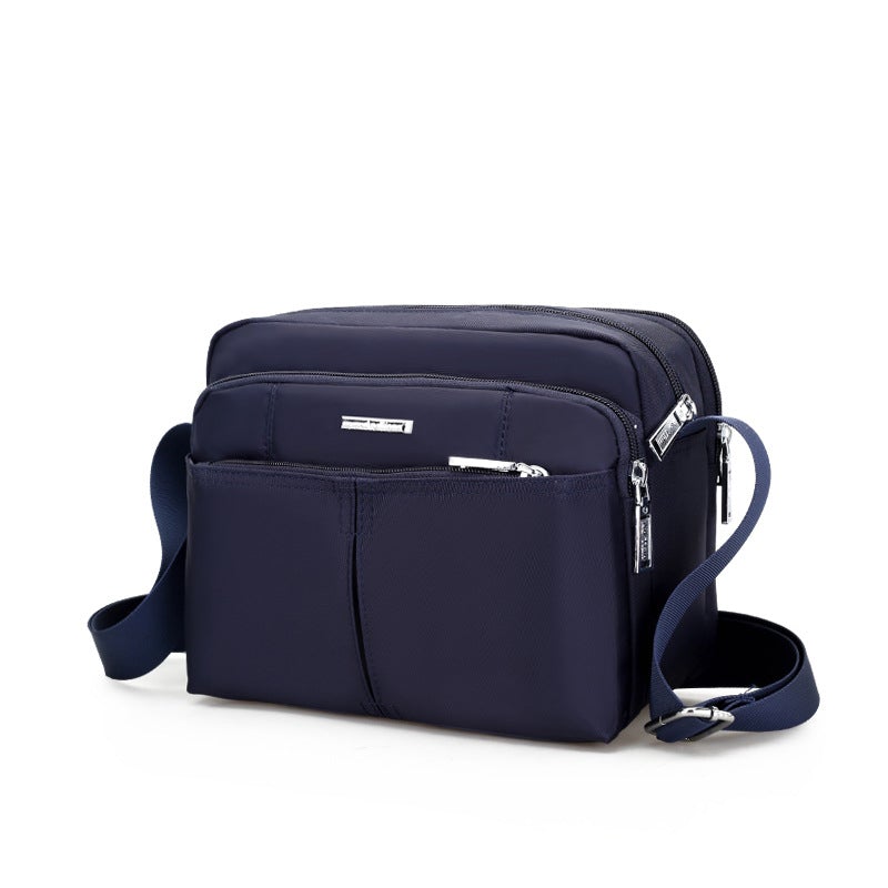 Water-Resistant Multi-Compartment Crossbody Bag with Adjustable Strap
