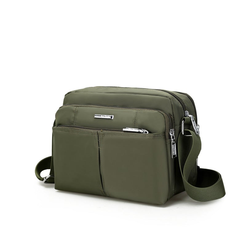 Water-Resistant Multi-Compartment Crossbody Bag with Adjustable Strap