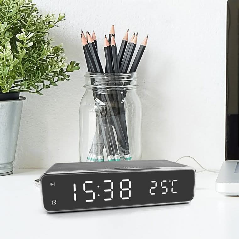 Sleek Alarm Clock with Integrated Wireless Charging Station