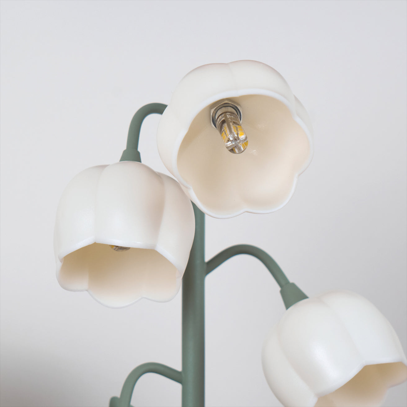 Table lamp featuring a bell orchid