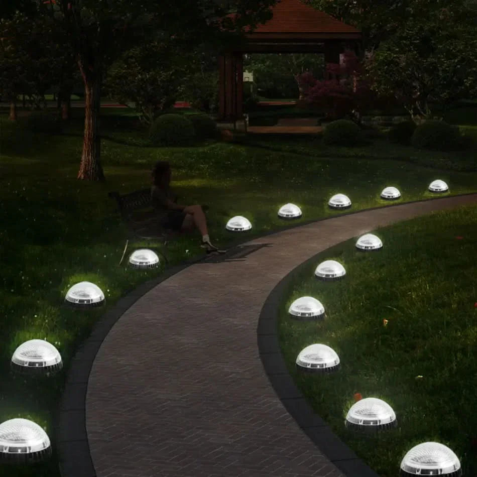 Solar-Powered Waterproof Ground Lights for Outdoor Spaces